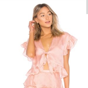 Winnie polka dot blouse in pink. Tularosa/Revolve